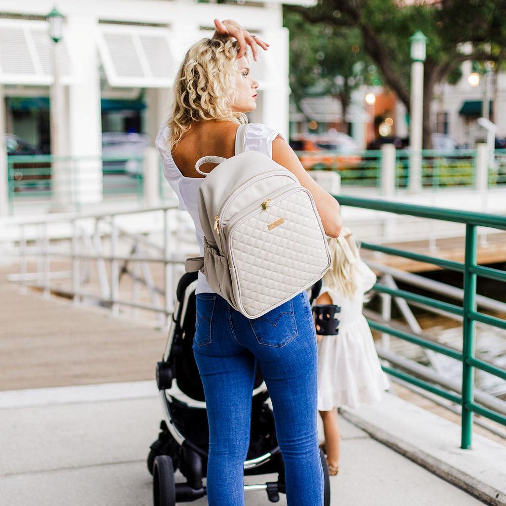 Vegan leather diaper changing bag in cream