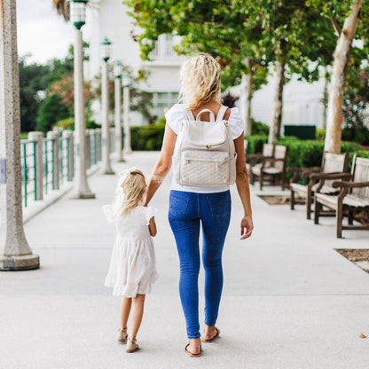 Mom and daughter with the bellaboo mabel cream diaper backpack